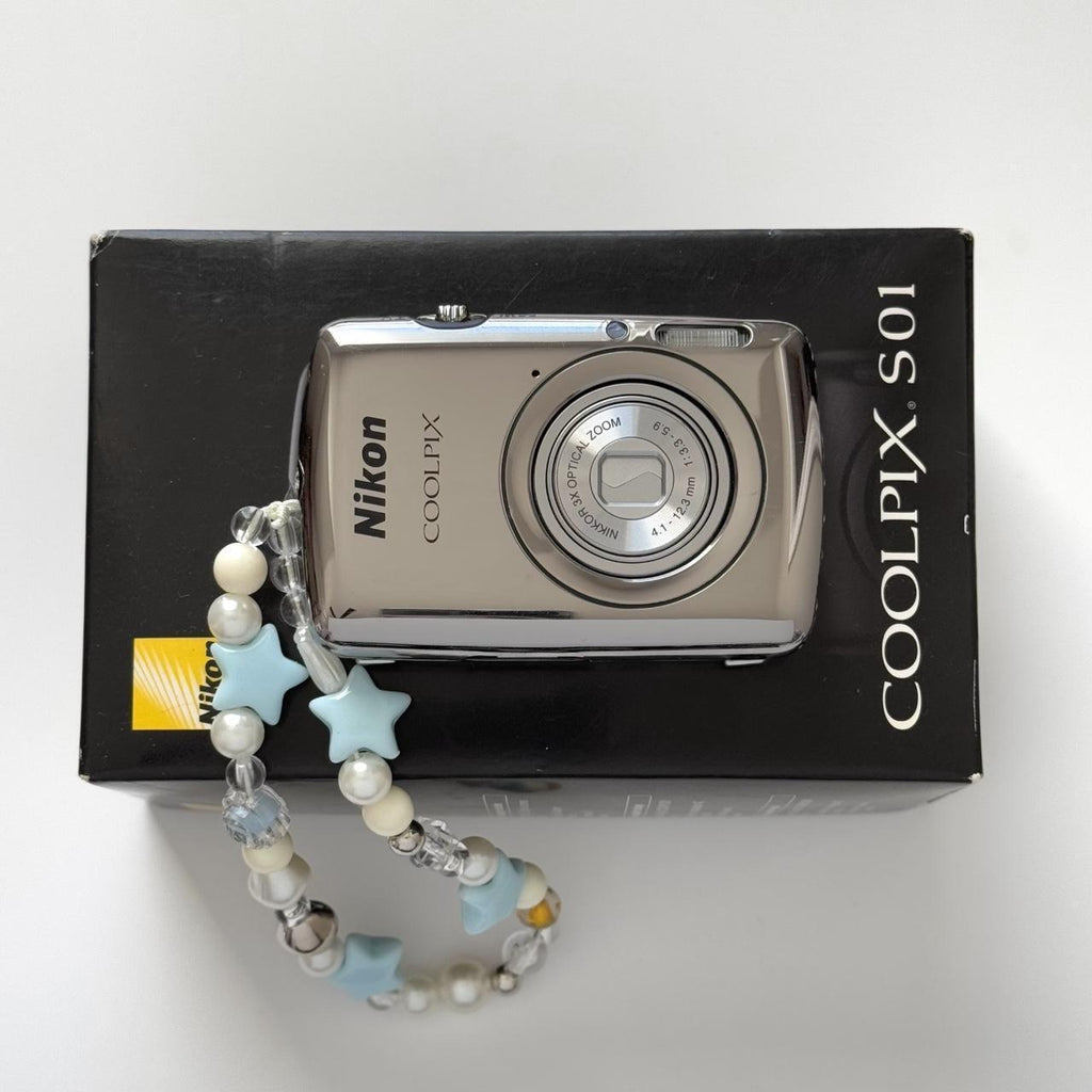 Nikon Coolpix S01 Mini Digital CameraThis ultra...